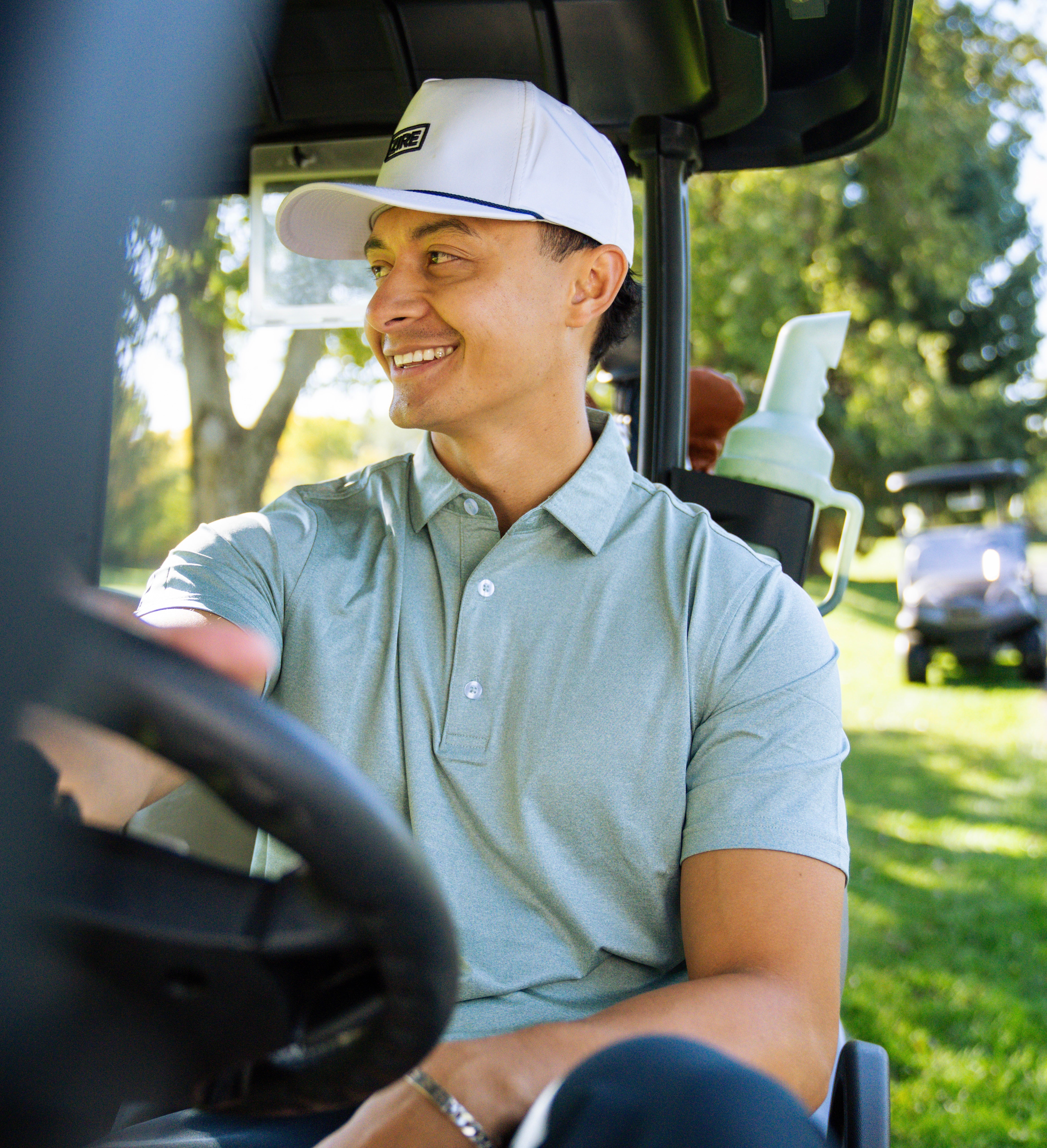 THE HEATHER GREEN PERFORMANCE POLO