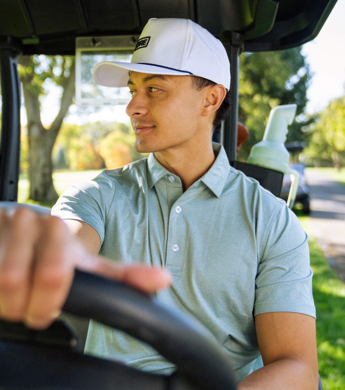 THE HEATHER GREEN PERFORMANCE POLO