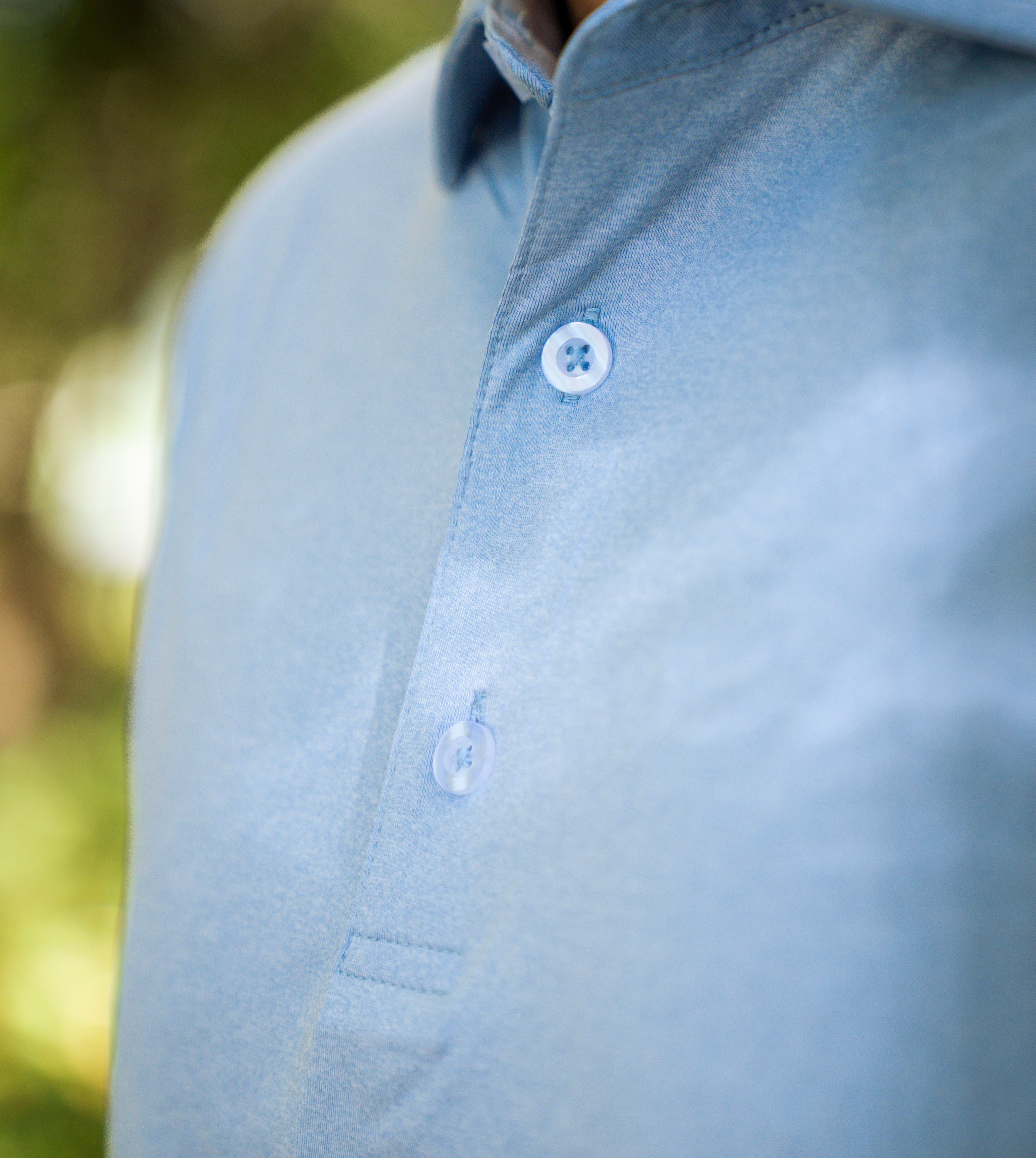 THE HEATHER LIGHT BLUE PERFORMANCE POLO