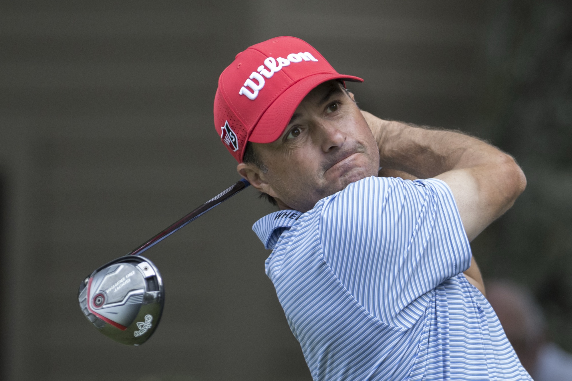 Kevin Kisner watches his drive during the first round of the RBC Heritage golf tournament