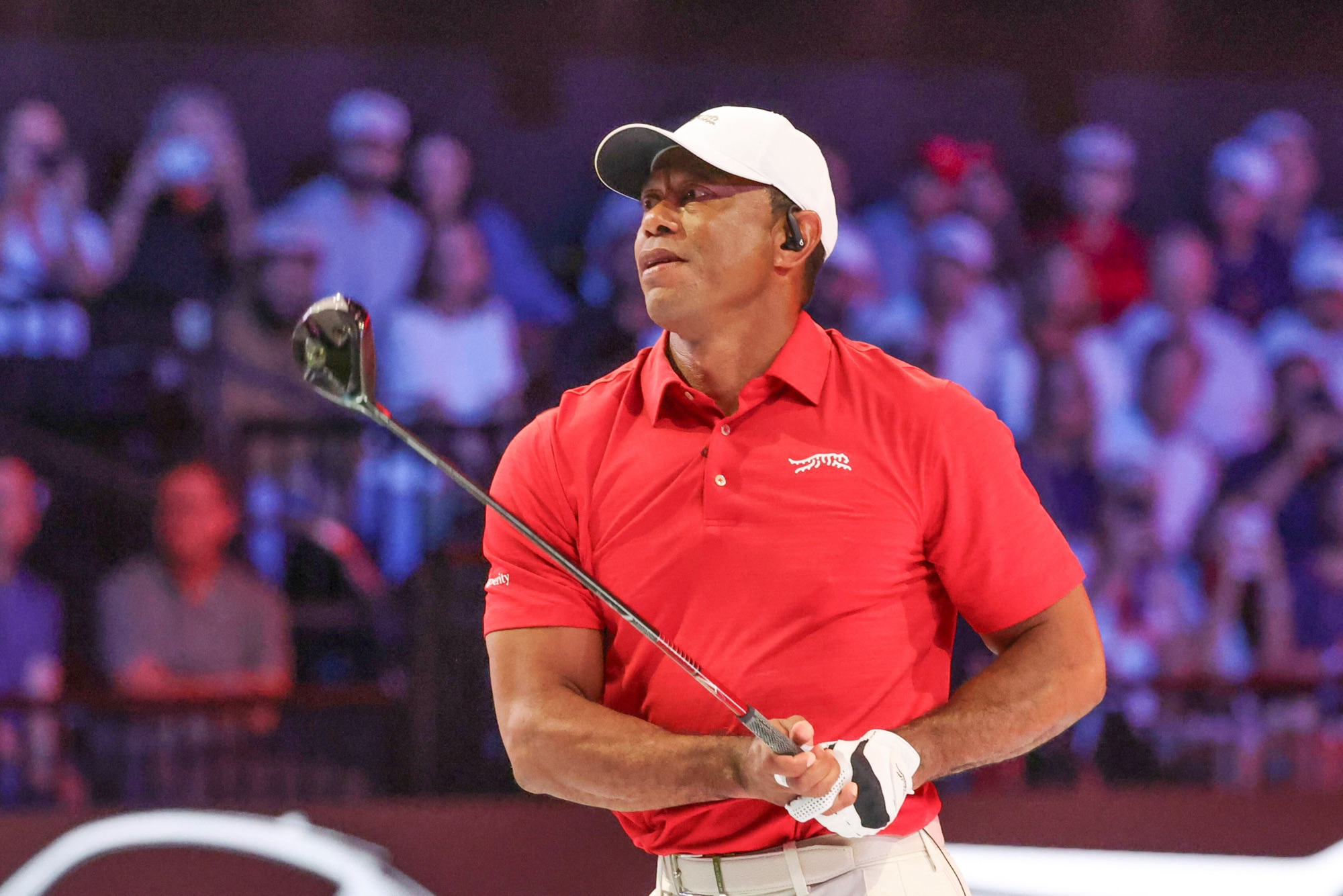 Tiger Woods hits his tee shot at Palm Beach Gardens during a 2026 golf tournament