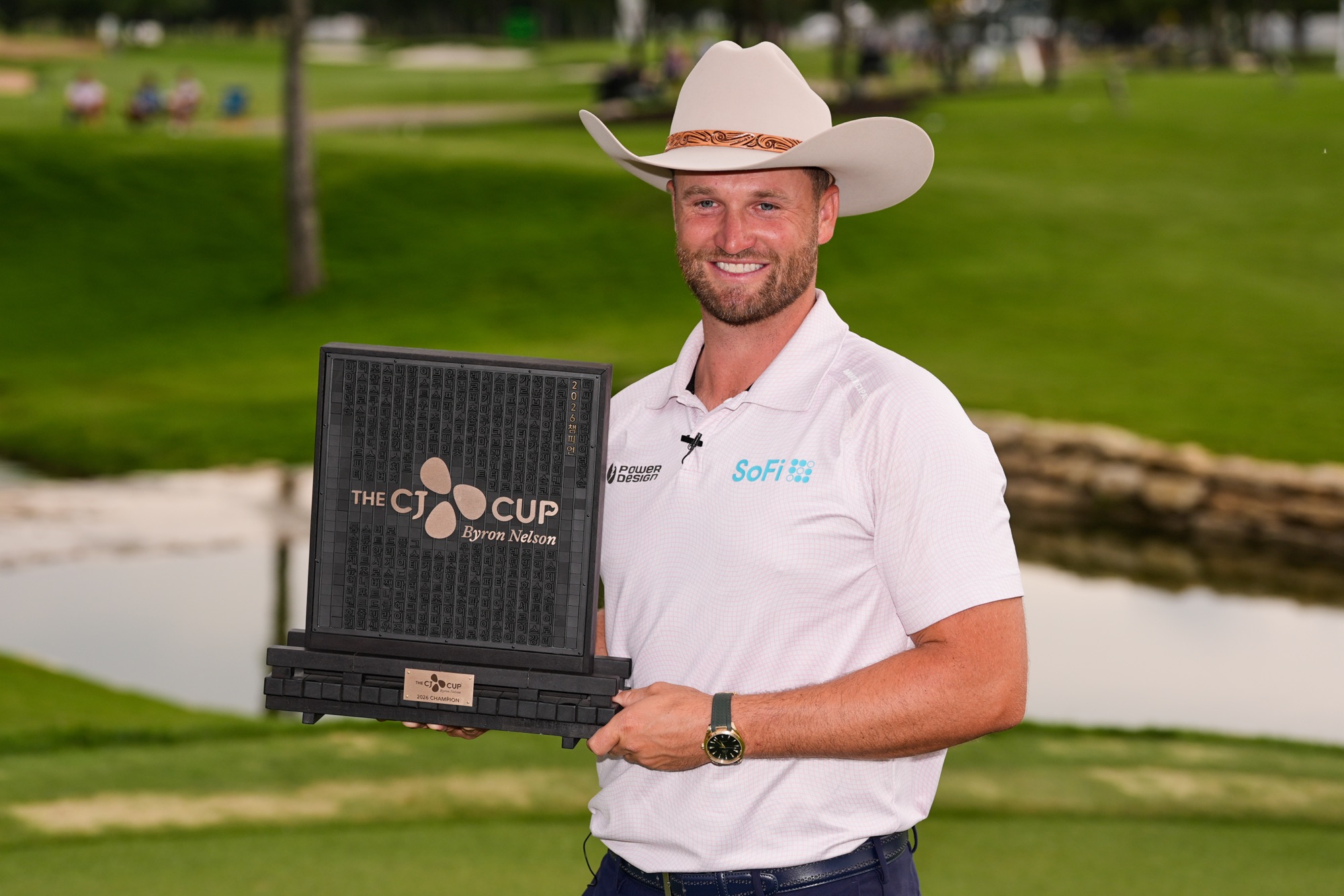 Wyndham Clark poses for photos after winning the 2026 CJ Cup Byron Nelson in McKinney, Texas