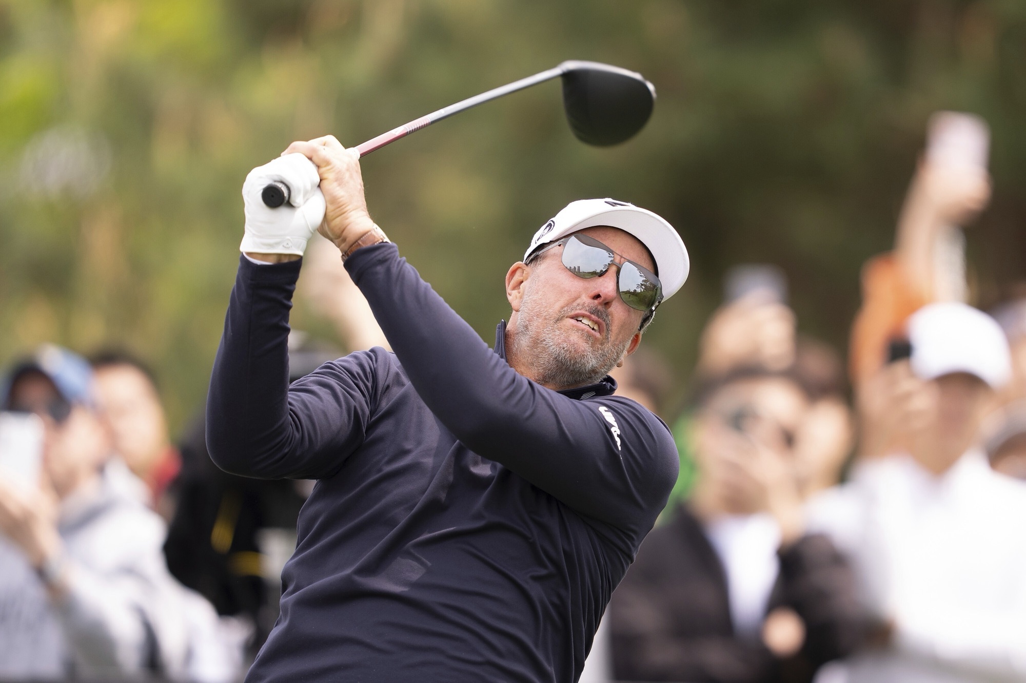 Phil Mickelson hits from the 11th tee during the first round of LIV Golf Korea at Jack Nicklaus Golf Club
