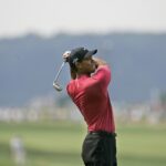 Tiger Woods hits an iron shot during the final round of the 2007 U.S. Open at Oakmont Country Club