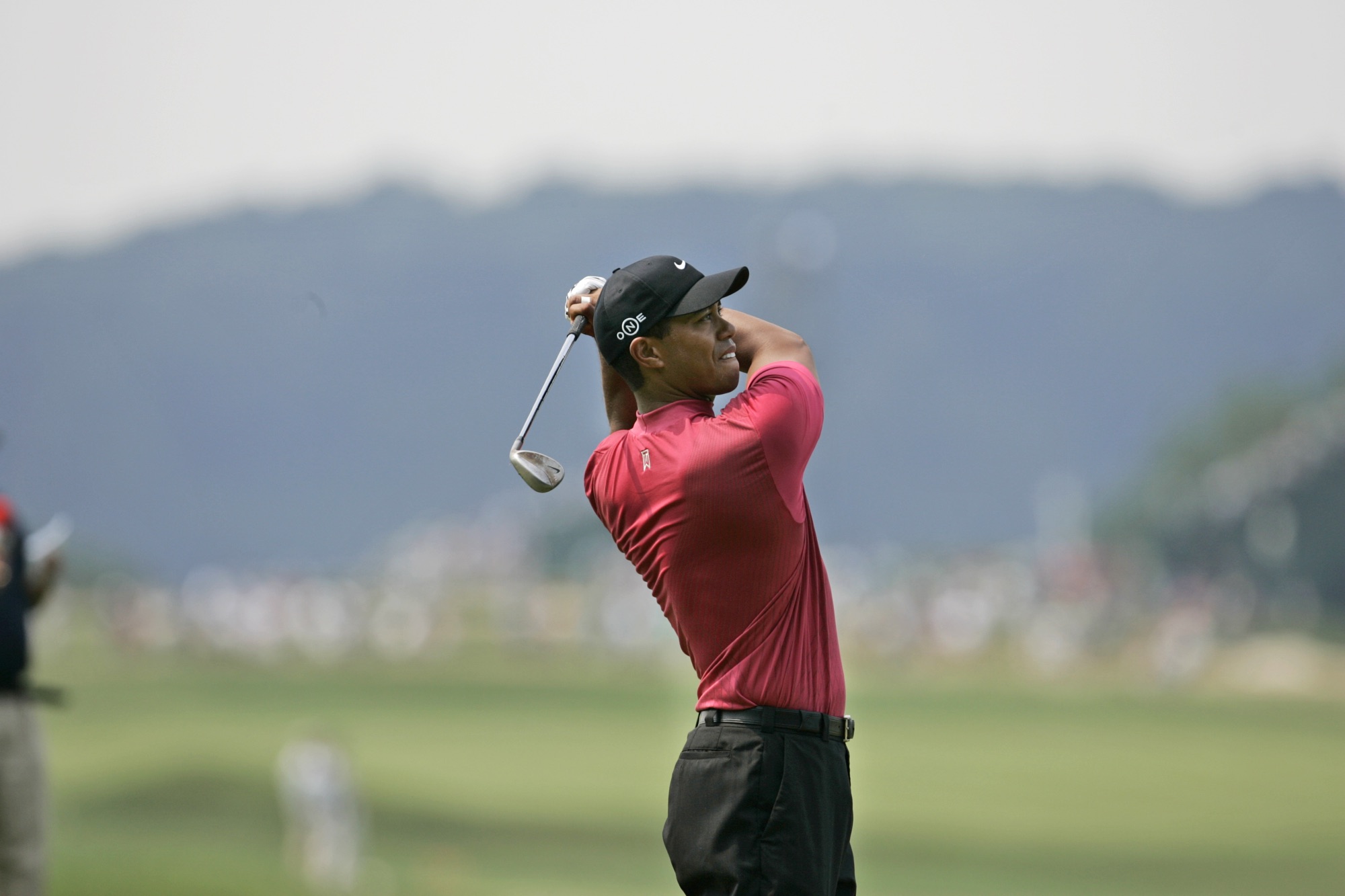 Tiger Woods hits an iron shot during the final round of the 2007 U.S. Open at Oakmont Country Club