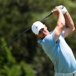 Brooks Koepka watches his tee shot on the sixth hole during a practice round for the 2026 U.S. Open at Shinnecock Hills Golf Club in Southampton, N.Y.