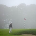 Taylor Montgomery walks to the green on the second hole during the first round of the U.S. Open at Shinnecock Hills Golf Club in Southampton, N.Y.