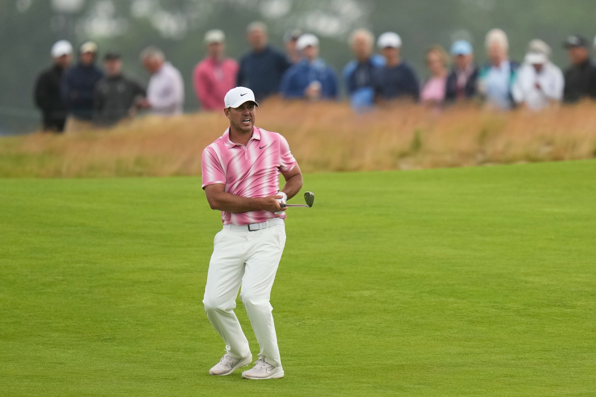 Brooks Koepka hits from the fairway on the fifth hole during the first round of the U.S. Open at Shinnecock Hills Golf Club in Southampton, N.Y.