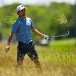 Joaquin Niemann hits from the rough during a practice round at the U.S. Open at Shinnecock Hills