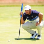 Bryson DeChambeau reads a putt during a practice round at the U.S. Open at Shinnecock Hills