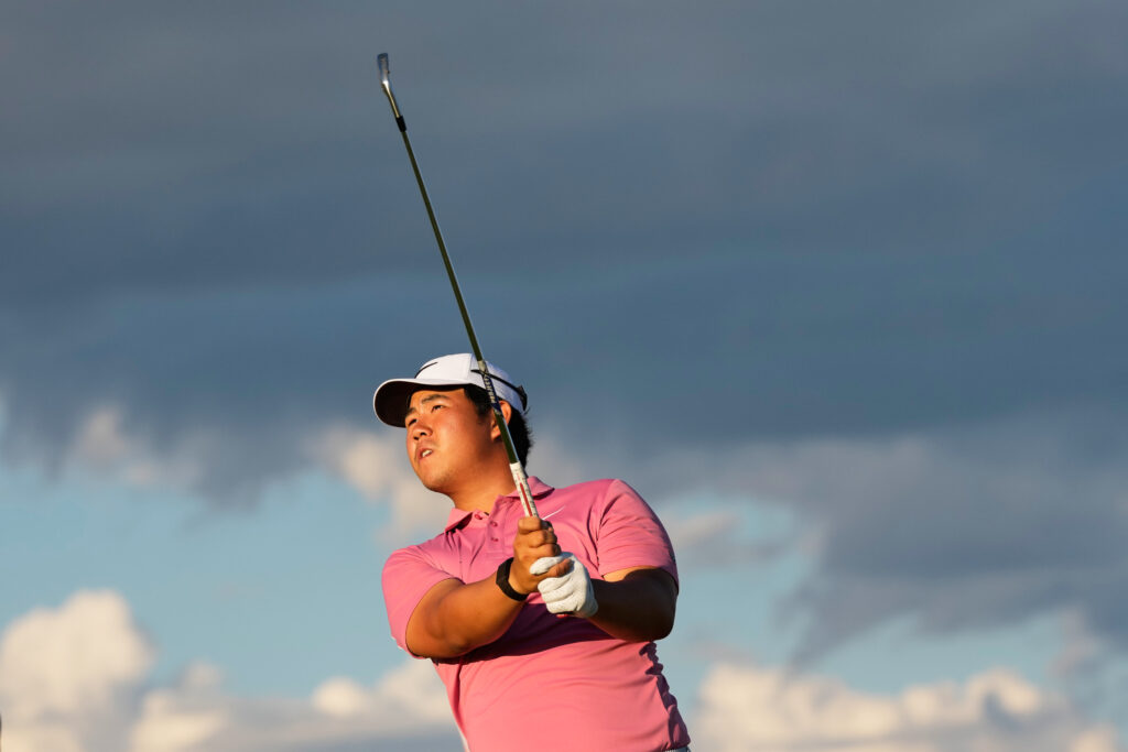 Tom Kim watches his tee shot at the 2026 U.S. Open
