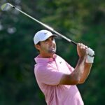 Scottie Scheffler hits off the fifth hole at the 2026 Travelers Championship