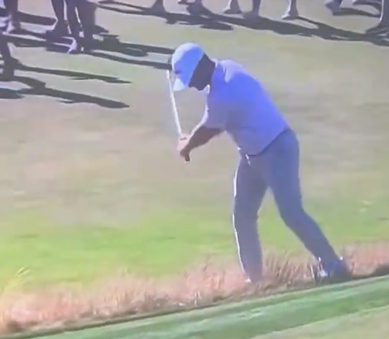 Bryson DeChambeau plays a shot from the thick fescue rough during the Open Championship at Royal Birkdale
