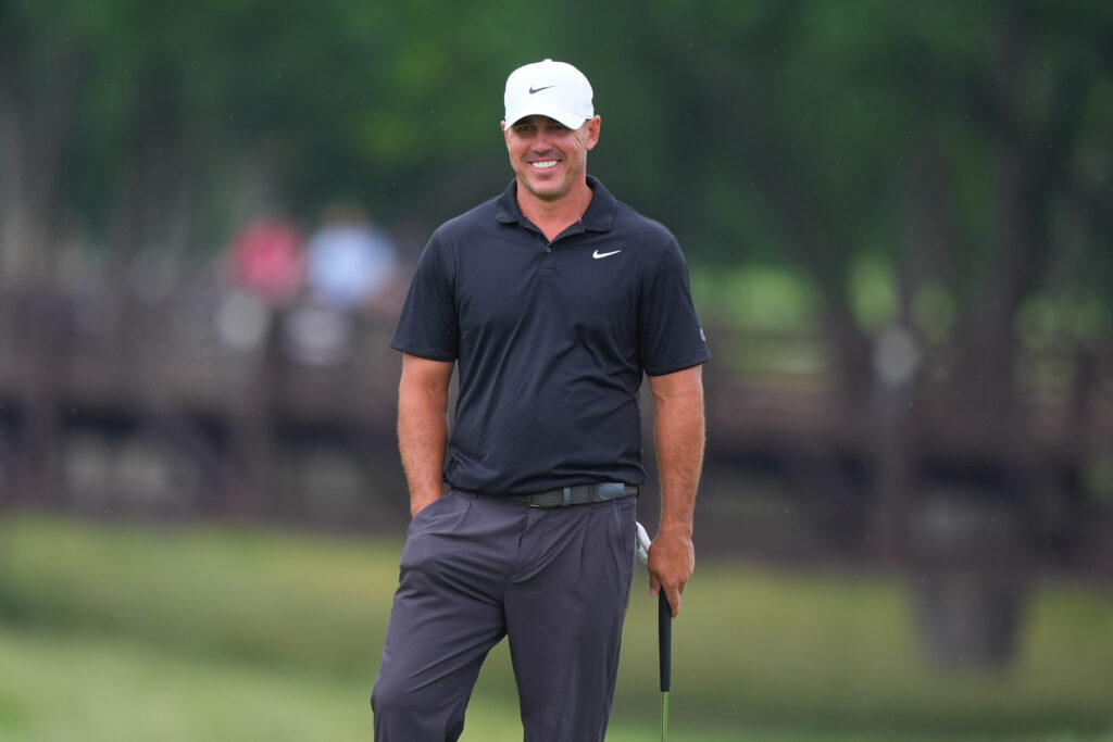 Brooks Koepka stands on the green during the Byron Nelson golf tournament in McKinney, Texas.