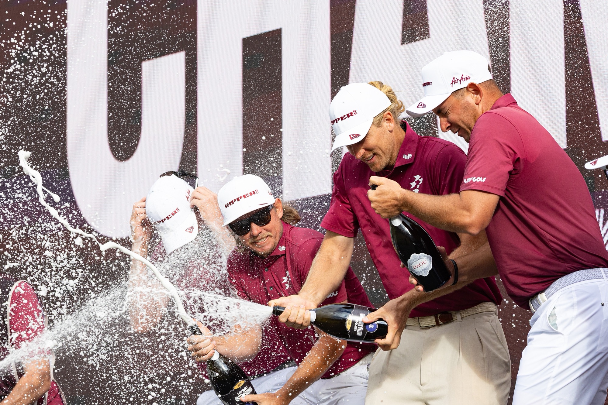 Ripper GC's Cameron Smith, Marc Leishman, Lucas Herbert and Travis Smyth celebrate after winning the team title at LIV Golf United Kingdom
