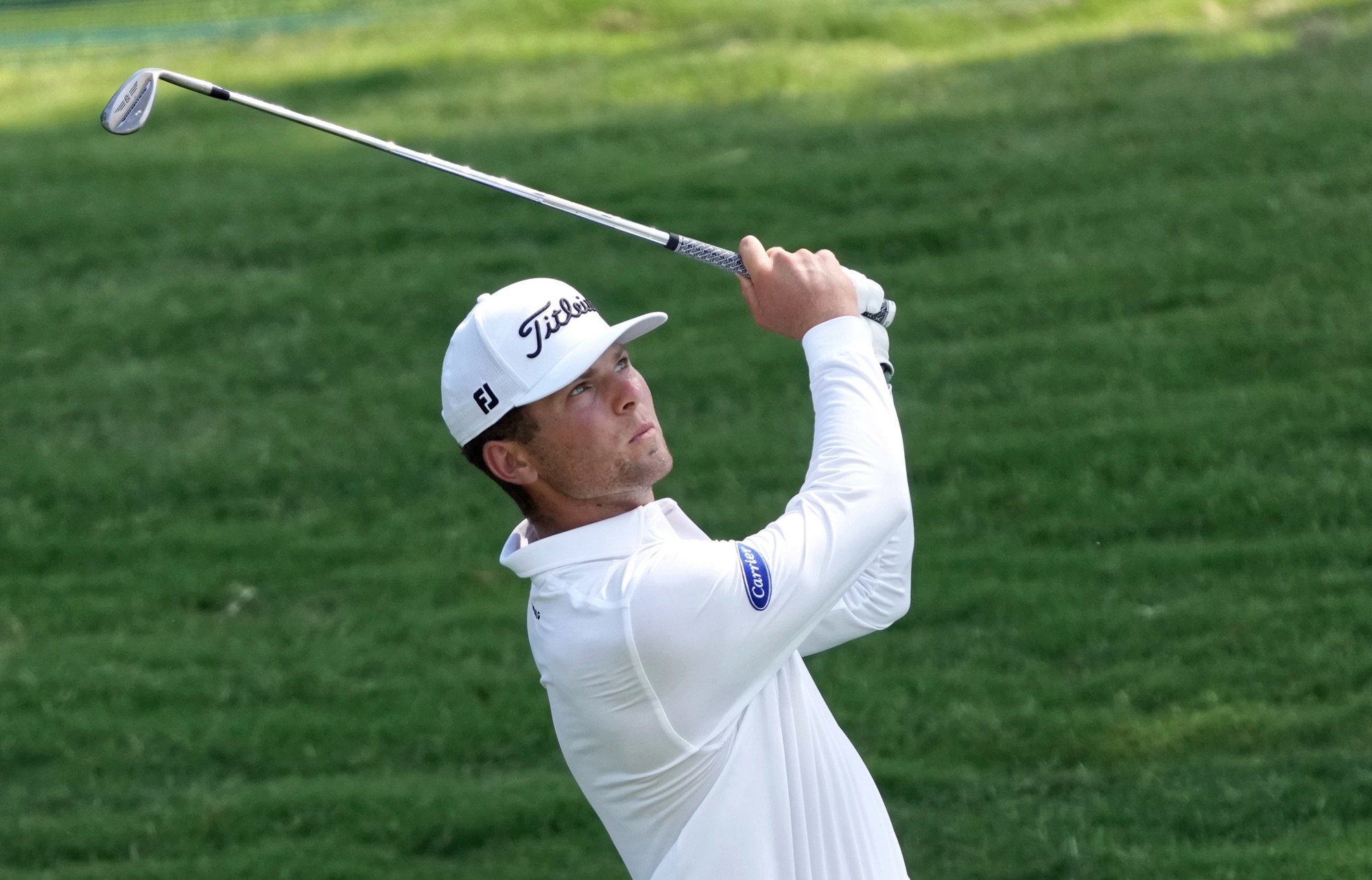 Michael Brennan hits an approach shot during the final round of the Wyndham Championship at Sedgefield Country Club.