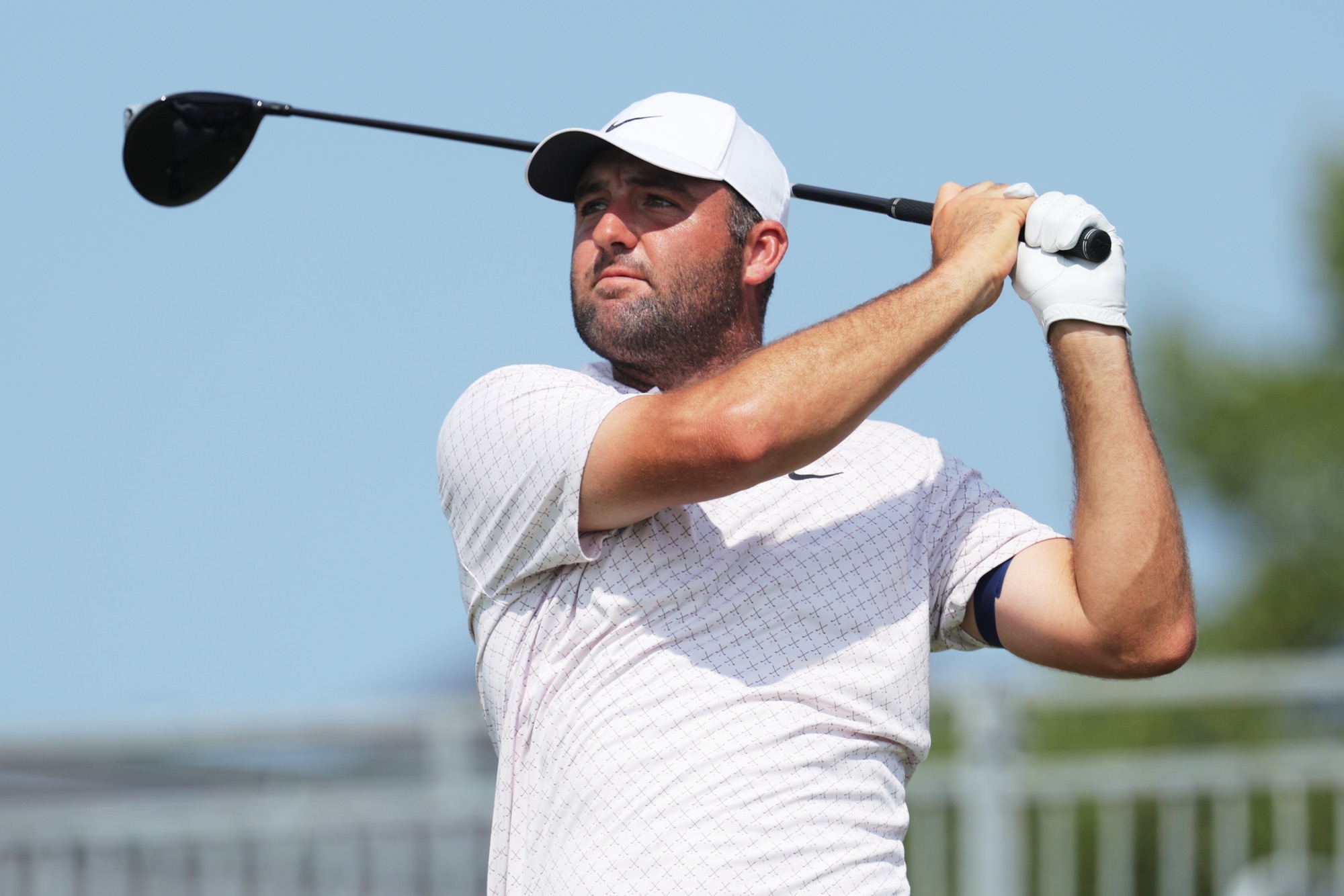 Scottie Scheffler tees off during the final round of the 3M Open