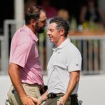 Scottie Scheffler and Rory McIlroy shake hands after the second round of the St. Jude Championship