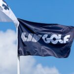 A LIV Golf flag flies at a tournament venue