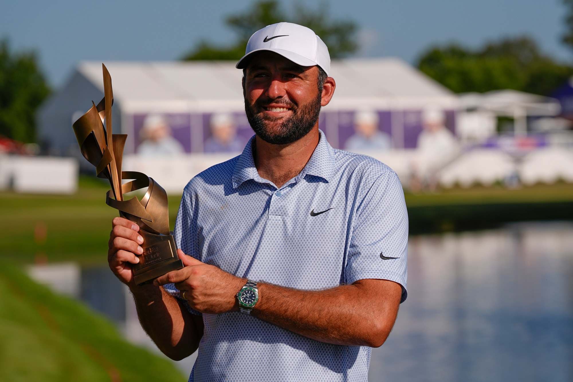 Scottie Scheffler holds the winning trophy after the final round of the FedEx St. Jude Championship on Sunday, Aug. 16, 2026, in Memphis, Tennessee