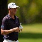 Justin Thomas walks up the ninth fairway during the second round of the St. Jude Championship golf tournament Friday, Aug. 14, 2026, in Memphis, Tenn.