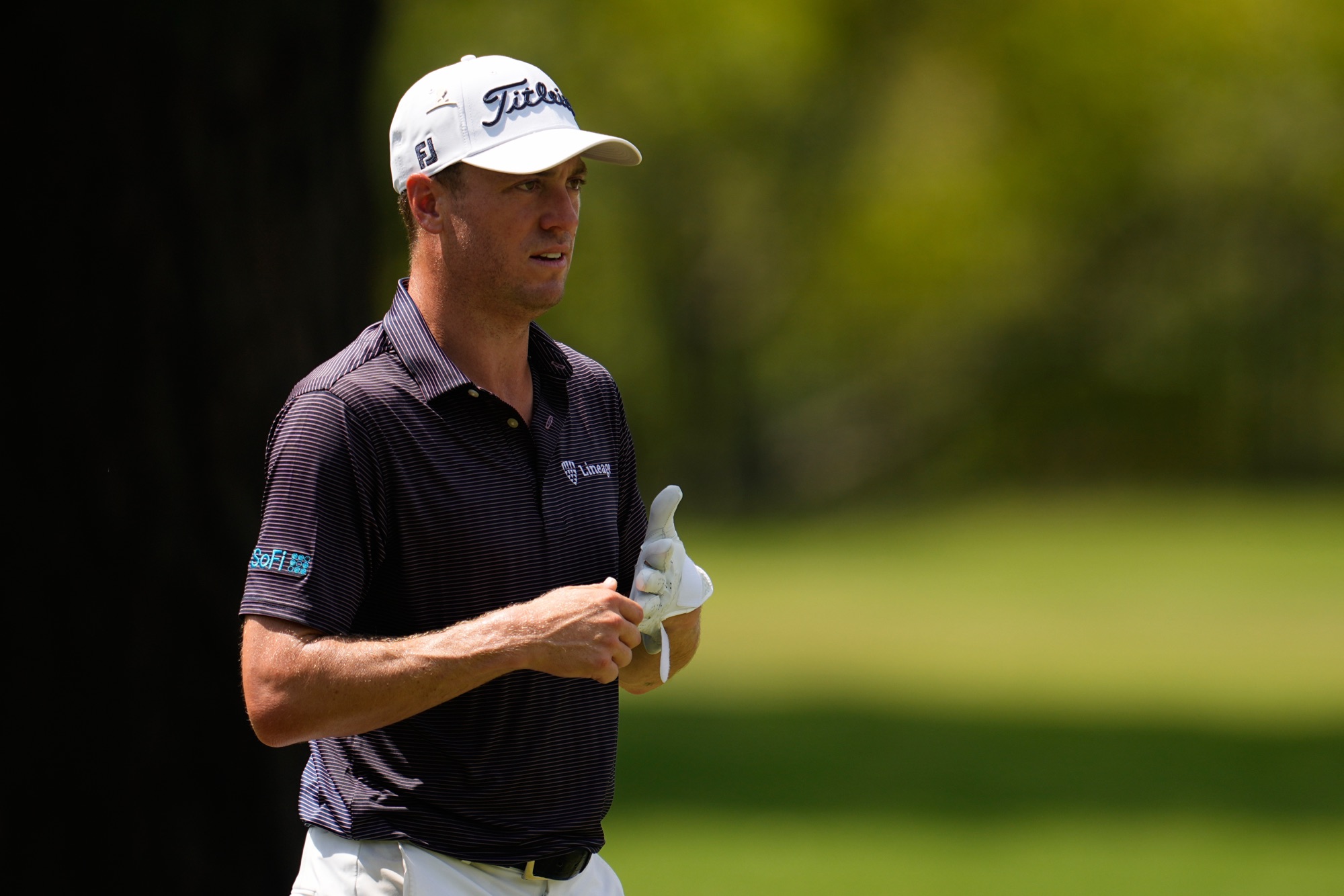 Justin Thomas walks up the ninth fairway during the second round of the St. Jude Championship golf tournament Friday, Aug. 14, 2026, in Memphis, Tenn.