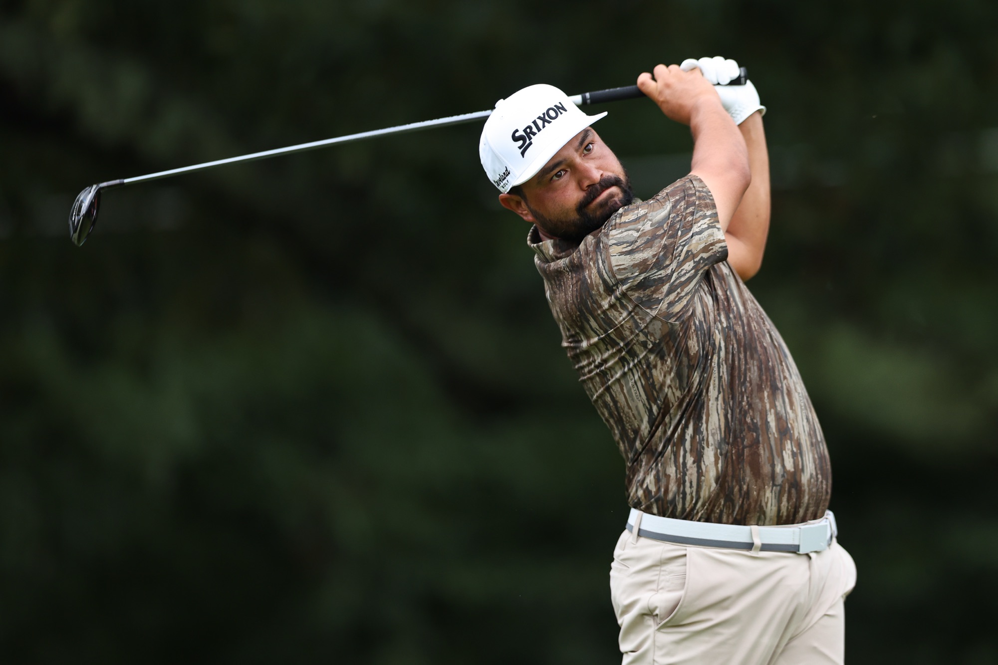 JJ Spaun hits a shot during the 2026 BMW PGA Championship at Wentworth Club