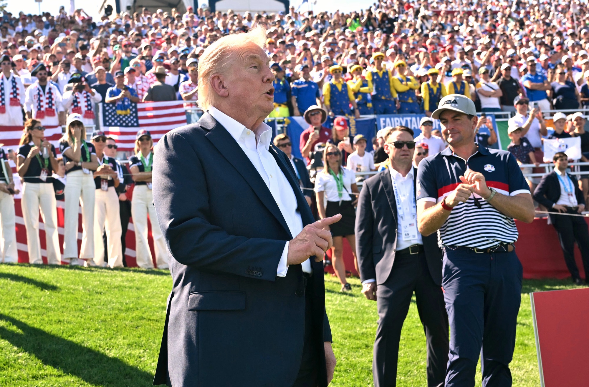 President Donald Trump speaks as U.S. captain Keegan Bradley looks on at the 2025 Ryder Cup at Bethpage Black