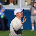 Rory McIlroy acknowledges the crowd on the 18th hole at the 2026 BMW PGA Championship at Wentworth