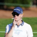 Charley Hull smokes a cigarette during the second round of The Annika at Pelican Golf Club in 2024