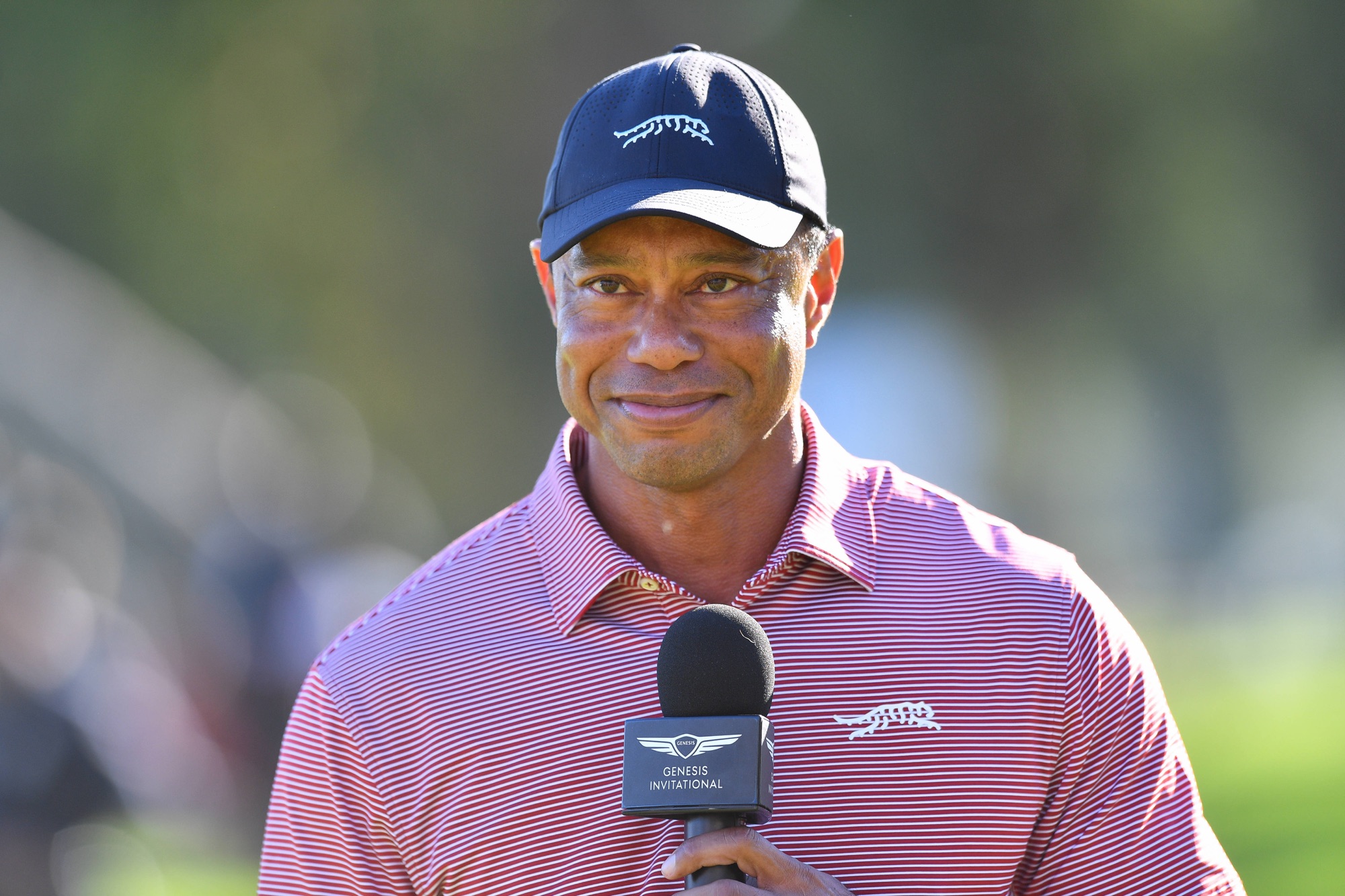 Tiger Woods talks to the crowd after the final round of the 2026 Genesis Invitational at Riviera Country Club