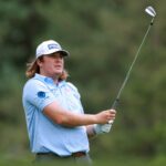 Neal Shipley hits his tee shot on the ninth hole during the final round of the 2024 Rocket Mortgage Classic at Detroit Golf Club
