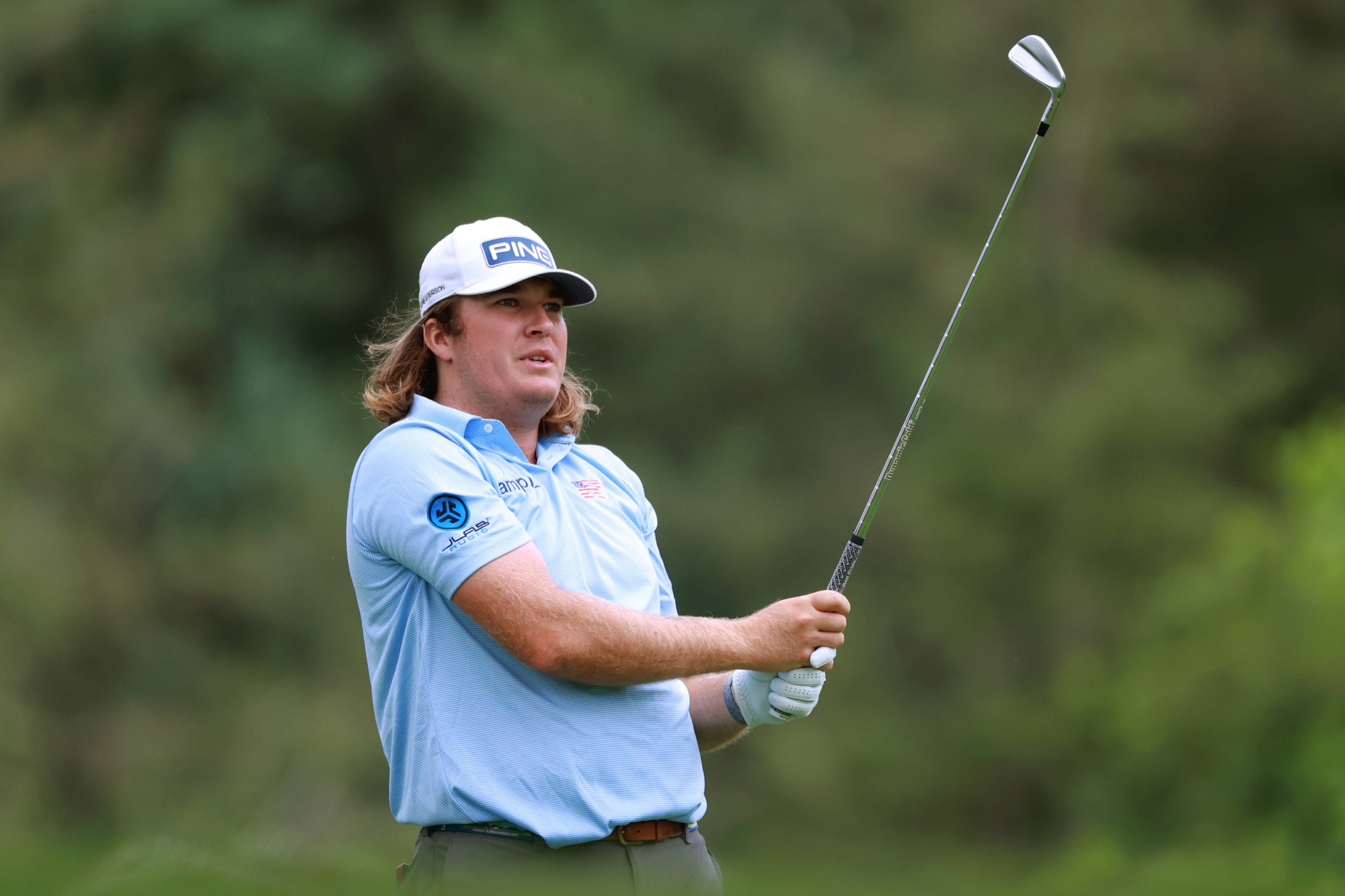 Neal Shipley hits his tee shot on the ninth hole during the final round of the 2024 Rocket Mortgage Classic at Detroit Golf Club