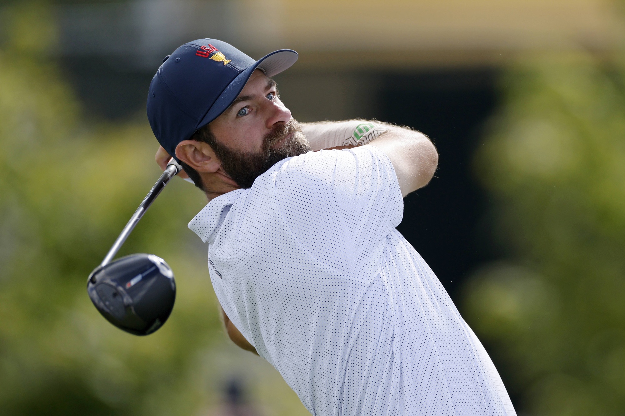 Cameron Young hits a drive on the third hole at Medinah Country Club ahead of the 2026 Presidents Cup